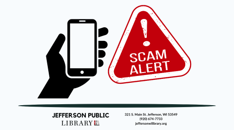 Hand holding a cell phone next to a red triangle with the words scam alert.